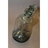 AN UNUSUALLY SHAPED VINTAGE GLUG GLUG DECANTER