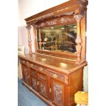 A LARGE EDWARDIAN MAHOGANY MIRRORBACKED SIDEBOARD