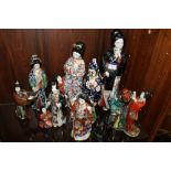 EIGHT LARGE JAPANESE CERAMIC FIGURES