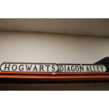 TWO REPRODUCTION WOODEN HARRY POTTER SIGNS 'HOGWARTS' & 'DRAGON ALLEY'