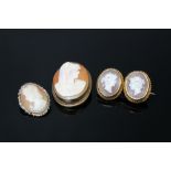 THREE CAMEO BROOCHES, to include a double head example