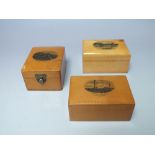A COLLECTION OF THREE MAUCHLINE WARE BOXES, comprising two French examples and a 'Carpet Garden Eas