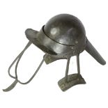 A RARE ENGLISH CIVIL WAR PERIOD SIEGE HELMET, of heavily blackened iron construction, two piece rou