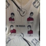 THE BEATLES - A 1960s VINTAGE BEATLES BLANKET, with portrait images and musical instruments decorat