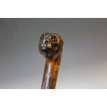 A CARVED WALKING STICK WITH BULLDOG HEAD HANDLE, circa 19th century, H 92 cm