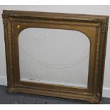 A VICTORIAN GOLD FRAME WITH SWEPT CORNERS AND ARCHED MOUNT, frame rebate 52 x 61 cm