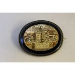 AN ITALIAN MICRO MOSAIC BROOCH DEPICTING THE VATICAN, W 4.25 cm