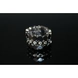 A 18 CARAT WHITE GOLD GUCCI RING, set with 7 brilliant cut diamonds totalling approx 0.70 carat wi