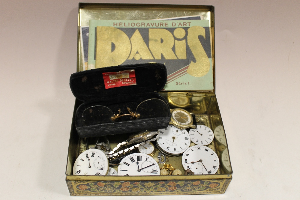 A TIN OF WRIST + POCKET WATCH PARTS, MOVEMENTS, GOLD PLATED SPECTACLES ETC