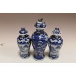 THREE ORIENTAL BLUE & WHITE LIDDED VASES A/F