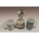 A MUSICAL ROYAL DOULTON SNOWMAN FIGURE + TWO ROYAL DOULTON SNOWMAN MUGS (3)