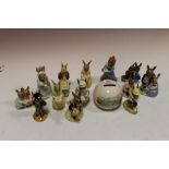 A COLLECTION OF THIRTEEN ROYAL DOULTON BUNNYKINS FIGURES + A BUNNYKINS MONEY BANK - BOXED