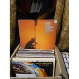 A BOX OF ASSORTED RECORDS, TO INCLUDE U2, PET SHOP BOYS, QUEEN, TOP GUN ETC