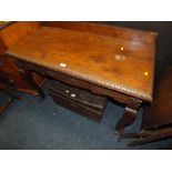 A CARVED OAK SERVING TABLE WITH SINGLE FRIEZE DRAWER