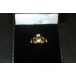 A 9CT GOLD DRESS RING