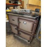 A RAYBURN ROYAL OIL RUNNING COOKER