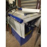 A BLUE FOLDING TABLE SAW