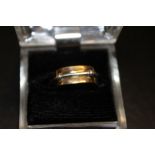 A BOXED 9CT GOLD GENTS RING