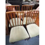 A SET OF FOUR RETRO TEAK CHAIRS