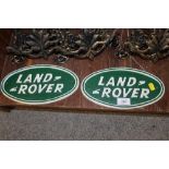 TWO CAST LAND ROVER SIGNS
