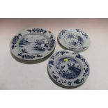 THREE VINTAGE ORIENTAL BLUE AND WHITE PLATES