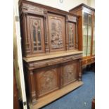 A FRENCH OAK BUFFET WITH CARVED AND GLAZED DETAIL