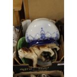 A BOX OF CERAMICS TO INCLUDE A LARGE GLAZED DOG FIGURE, BLUE AND WHITE JARDINAIRE ETC.