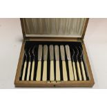 A CASED SET OF HALLMARKED SILVER BONE HANDLED FLATWARE