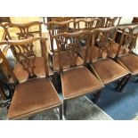 A SET OF EIGHT MAHOGANY CHIPPENDALE STYLE DINING CHAIRS