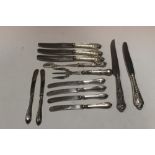 A SELECTION OF SILVER HANDLED KNIVES ETC