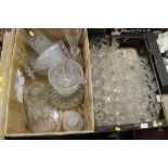TWO TRAYS OF CUT GLASS TO INCLUDE A LARGE QUANTITY OF DRINKING GLASSES, VASES, DECANTERS ETC