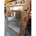 A CARVED OAK RECTANGULAR MIRROR, 80 x 64 cm