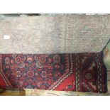 A RED WOOLLEN RUG