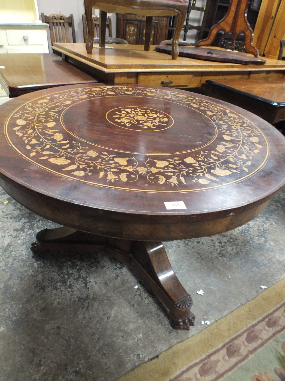 A 19TH CENTURY CIRCULAR MARQUETRY INLAID PEDESTAL TABLE RAISED ON TURNED BASE