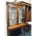 A MAHOGANY CHIPPENDALE STYLE GLAZED BOOKCASE OF SMALL PROPORTIONS WITH SINGLE DRAWER RAISED ON
