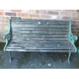 A CAST IRON ENDED GARDEN BENCH