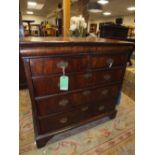 A QUEEN ANNE WALNUT CHEST OF DRAWERS, having a cushion fronted secret drawer above two short and