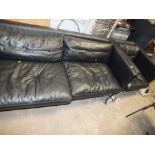 A BLACK LEATHER THREE SEATER SOFA & MATCHING ARMCHAIR