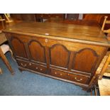 A 19TH CENTURY OAK AND MAHOGANY MULE CHEST WITH FIELDED ARCHED PANELS AND CROSSBANDING, W 128 cm