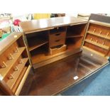 A RETRO TWIN DOOR OPENING SEWING CABINET