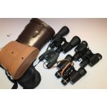 FOUR CASED PAIRS OF VINTAGE AND MODERN BINOCULARS