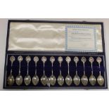 A BOXED SET OF TWELVE HALLMARKED SILVER ZODIAC SPOONS WITH CERTIFICATE