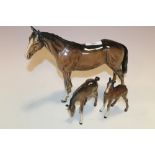 A LARGE BESWICK HORSE PLUS TWO FOALS (ONE A/F)