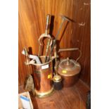 A BRASS AND COPPER COMPANION SET PLUS A COPPER KETTLE