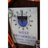A VINTAGE GLASS WEST BROMWICH BUILDING SOCIETY WALL HANGING CLOCK