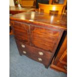 A GEORGIAN MAHOGANY COMMODE CHEST