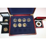 A COLLECTION OF COMMEMORATIVE GOLD PLATED COINS
