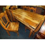A COLONIAL STYLE DINING TABLE & SIX CHAIRS