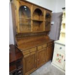 A HONEY PINE GLAZED PINE DRESSER