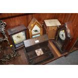 A QUANTITY OF VINTAGE CLOCKS, STATIONARY BOX AND A BAMBOO CABINET
